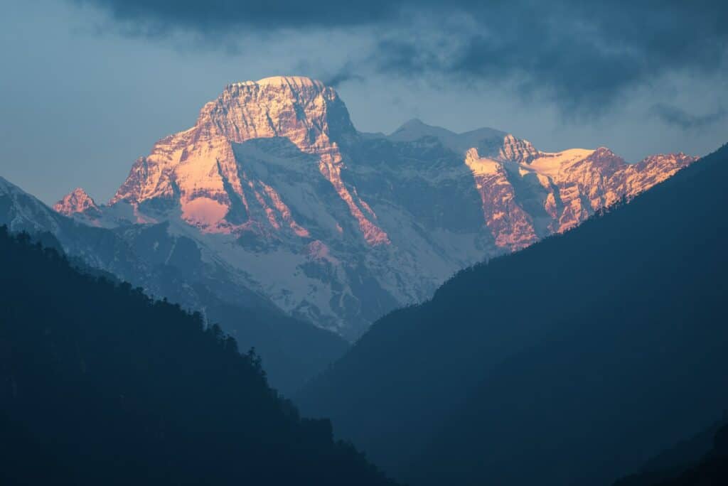 snow covered mountain during daytime