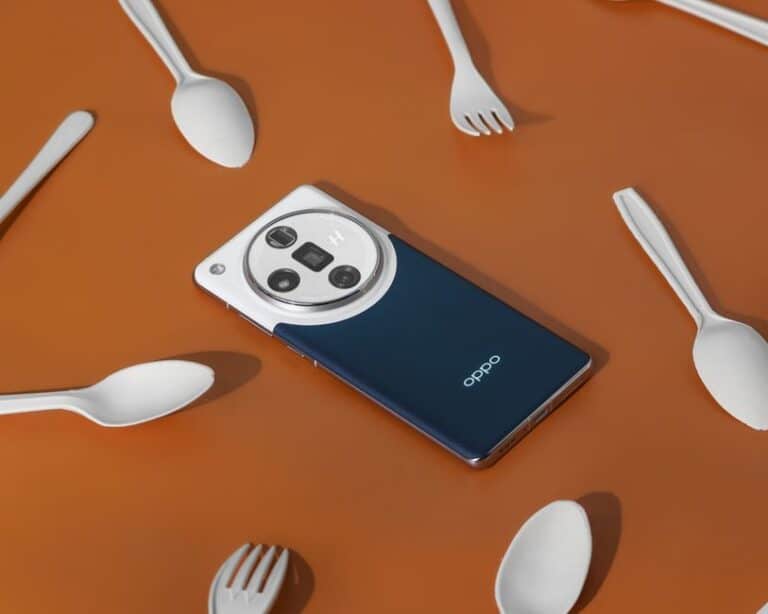 Oppo smartphone surrounded by white spoons and forks on a brown surface.